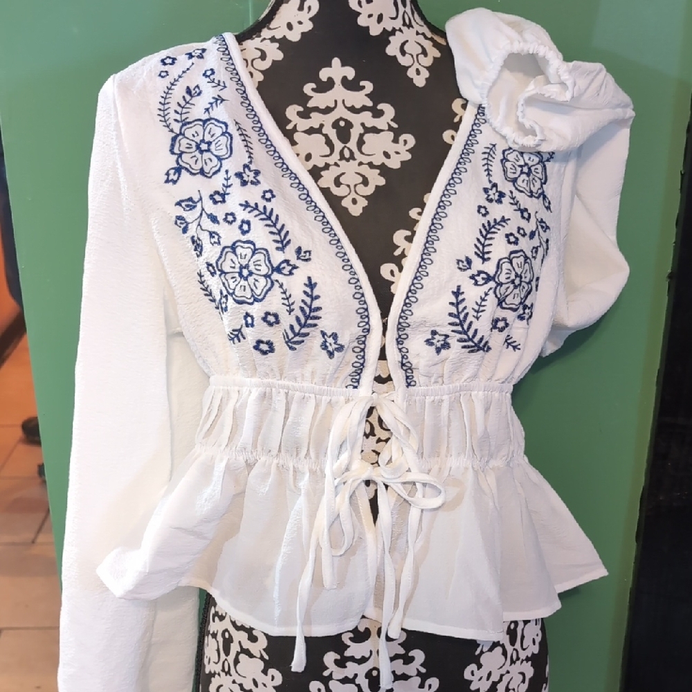 Floral Embroidered Peplum Blouse